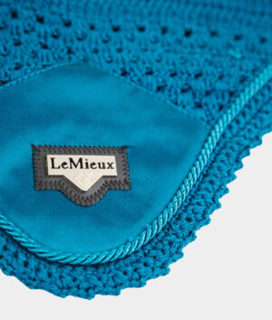 A close-up of the Forageplus and Le Mieux Fly Hood in marine colour