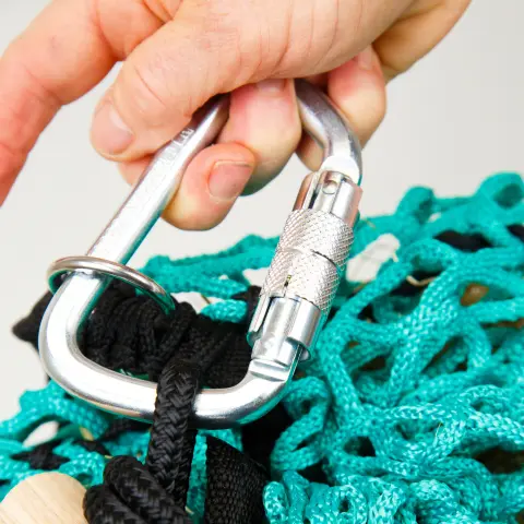 The screw-gate carabiner supplied with the Forageplus slow feeder hay net