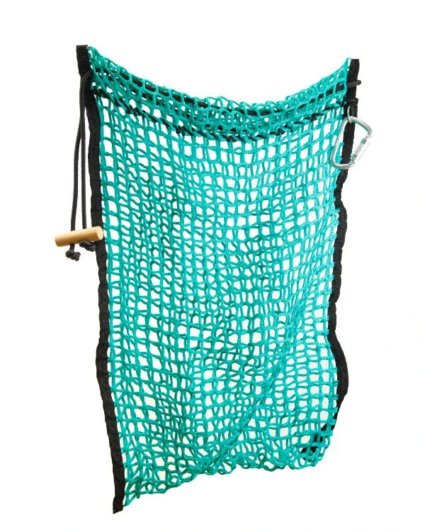 Forageplus knotless slow feeder hay net laid flat, showing the full 80 by 100cm mesh, reinforced black webbing edges, wooden toggle and screw-gate carabiner